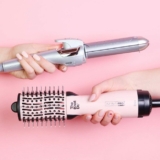 Win a Smoothwrap 2-in-1 Styler and one Knot Dr. All-in-One Mini Oval Dryer Brush from Conair