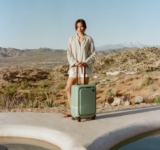 Win a Monos Sage Green Check-In Medium luggage & Carry-On